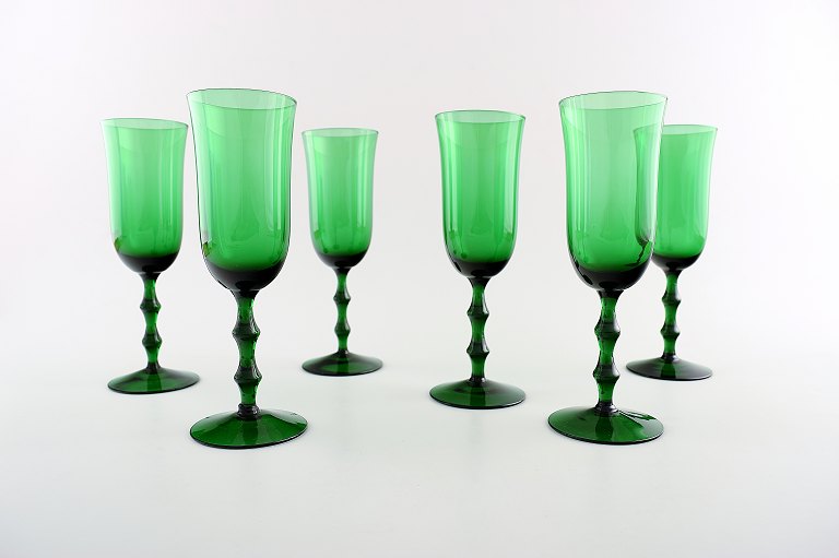 SIMON GATE ORREFORS, A set of six green champagne art glasses. 