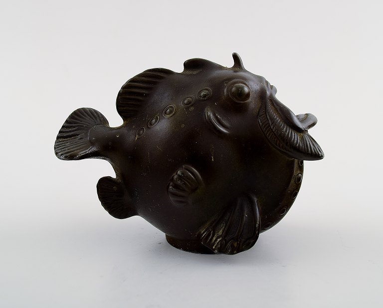 Figure of fish in disko metal, designed by Just Andersen.