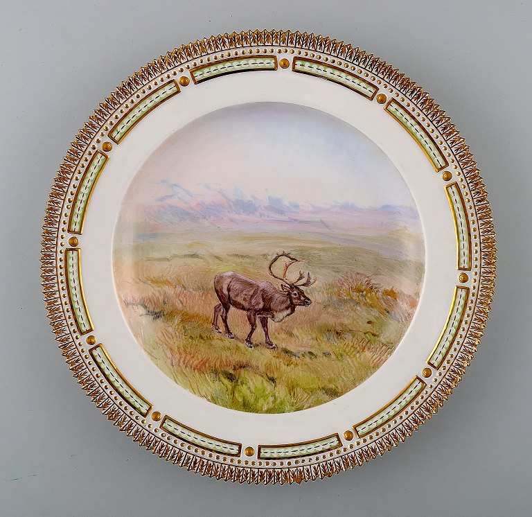 Royal Copenhagen Flora Danica / fauna Danica dinner plate with  motive of reindeer in landscape.