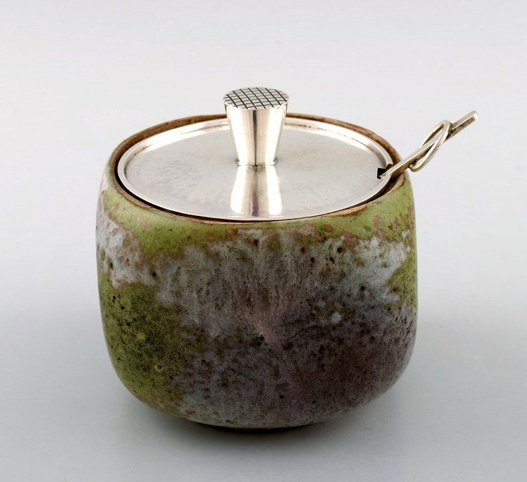 Hans Hansen (1884-1940) and Bode Willumsen (1895-1987).Unique jam jar of blue-green glazed stoneware, decorated with lidand Hans Hansen jam spoon in hammered sterling silver.