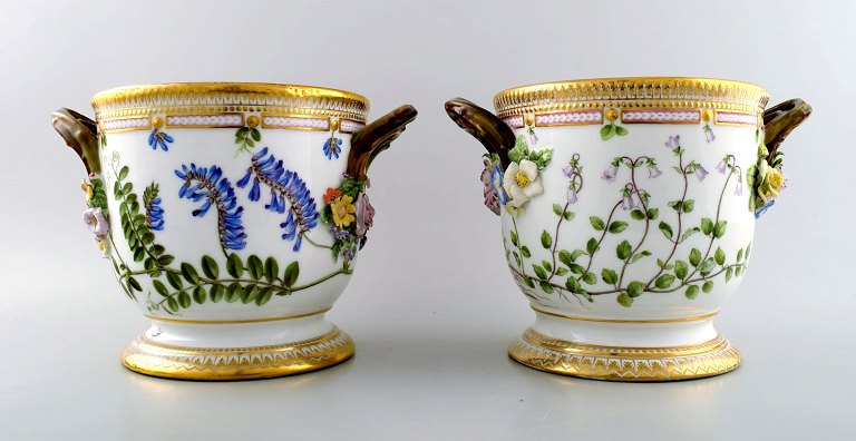 A pair of antique Royal Copenhagen "Flora Danica" large wine coolers/flower pots in porcelain.