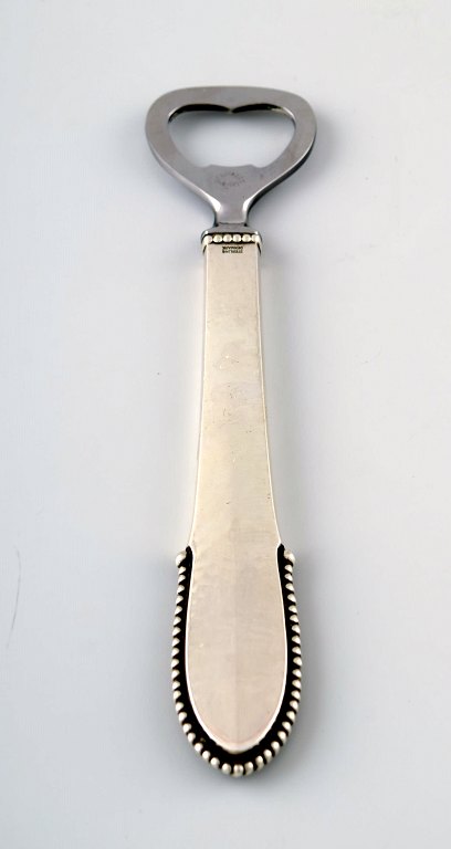 Georg Jensen kugle oplukker/flaskeåbner.