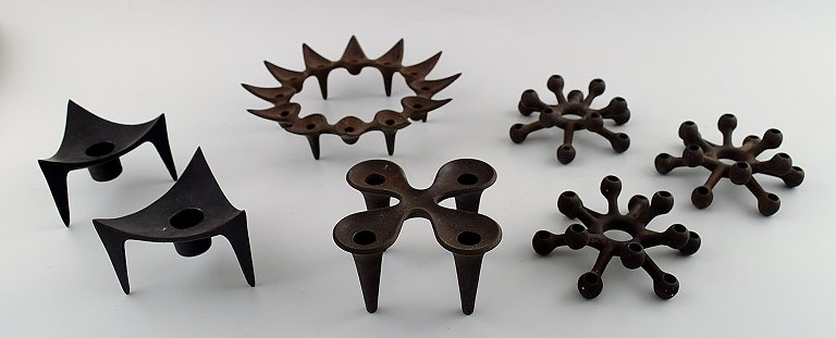 Jens H. Quistgaard, collection of candlesticks in cast iron.A total of 7 candlesticks.