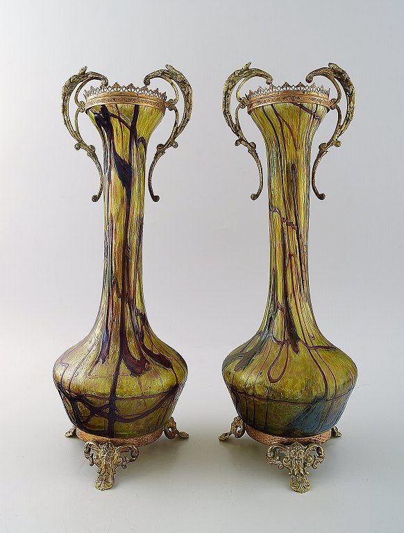 Art Nouveau a pair of large art glass vases, bronze fittings with salamander and faun.
