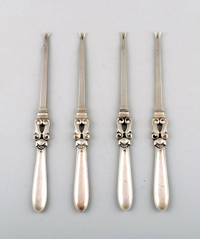 Georg Jensen. Sterling (925). Acorn. Four lobster forks.