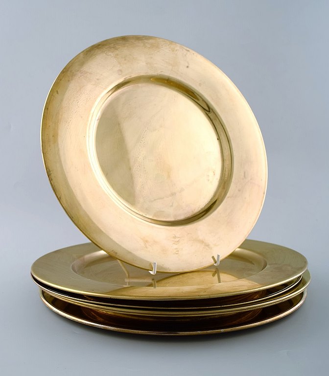 Sæt på seks dækketallerkener i messing. Dansk design, 60´erne.