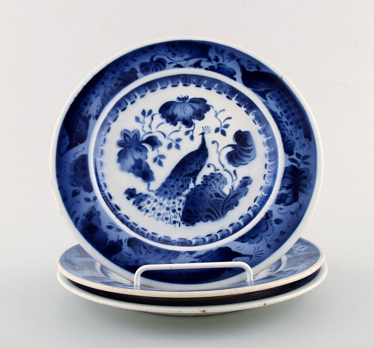 Peacock from Copenhagen faience / Aluminia.Flat plate in earthenware. 3 pieces in stock.