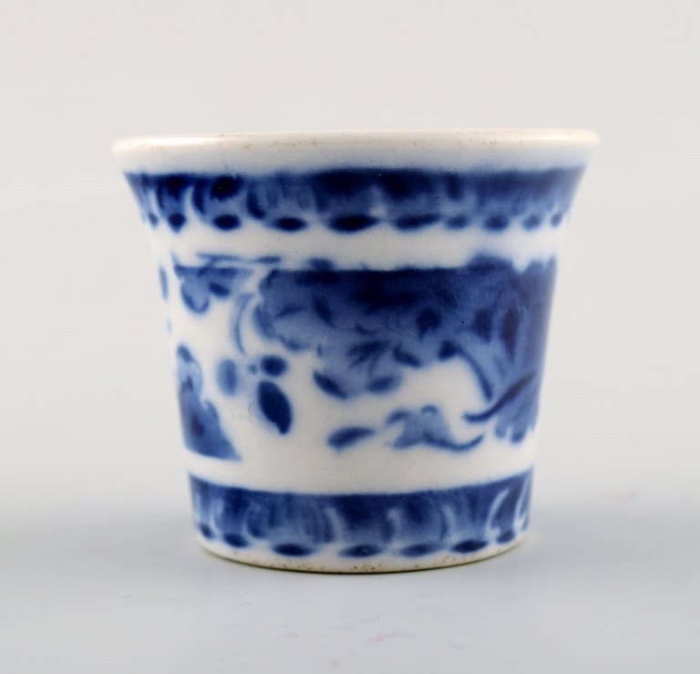 Peacock from Copenhagen faience / Aluminia.Egg cup in faience.