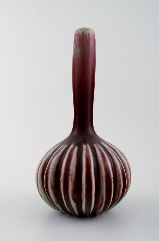Axel Salto for Royal Copenhagen stoneware vase modelled with narrow mouth and vertical fluted pattern.
