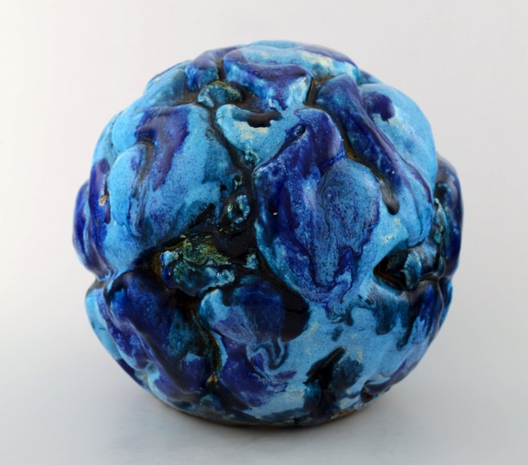Henrik Bruun. Spherical unique ceramic sculpture modeled with infants decorated with blue glaze.