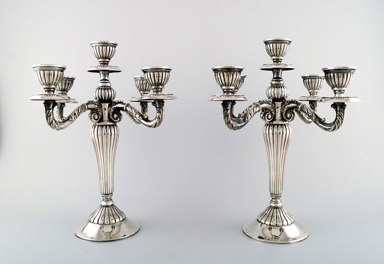 A pair of Spanish candelabra in silver, early 20th century.Fine quality, beautiful classic design.