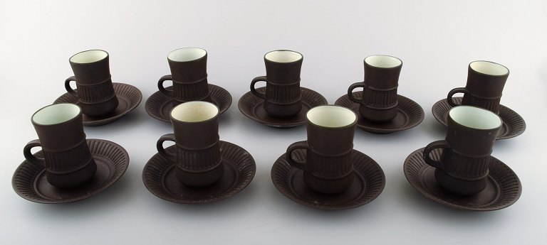 Jens H. Quistgaard, Flamestone.Nine coffee / mocha cups with saucers.