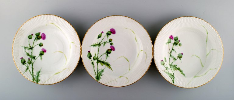 Three antique Royal Copenhagen plates hand painted in high quality with thistles.