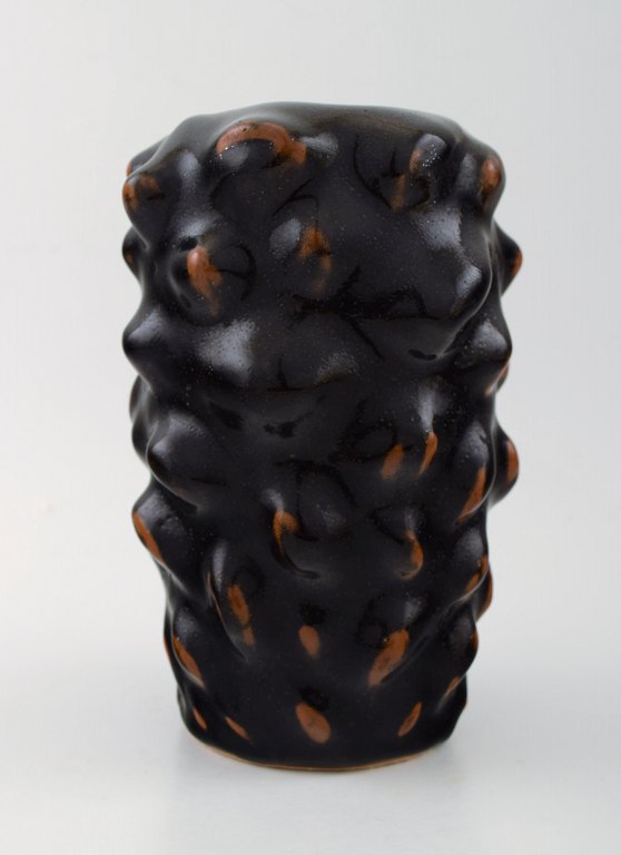 Axel Salto: b. Copenhagen 1889, d. Frederiksberg 1961:Stoneware vase modeled in budding style.