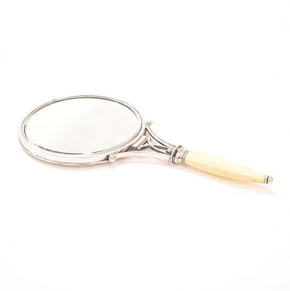 Johan Rohde for Georg Jensen: Acorn mirror with ivory grip. 1933-44. #220. L: 
26cm. W: 316gr