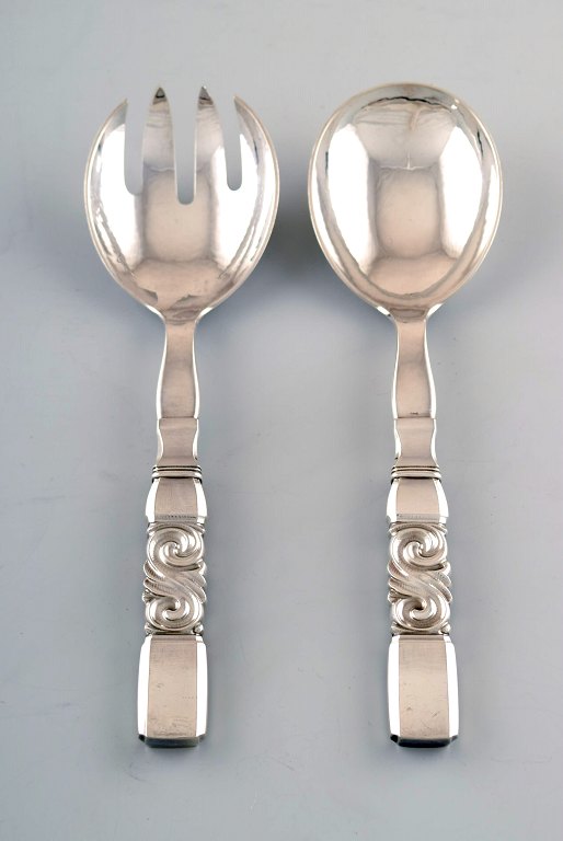 Georg Jensen. Cutlery, Scroll No. 22, hammered sterling silver salad set in full silver.