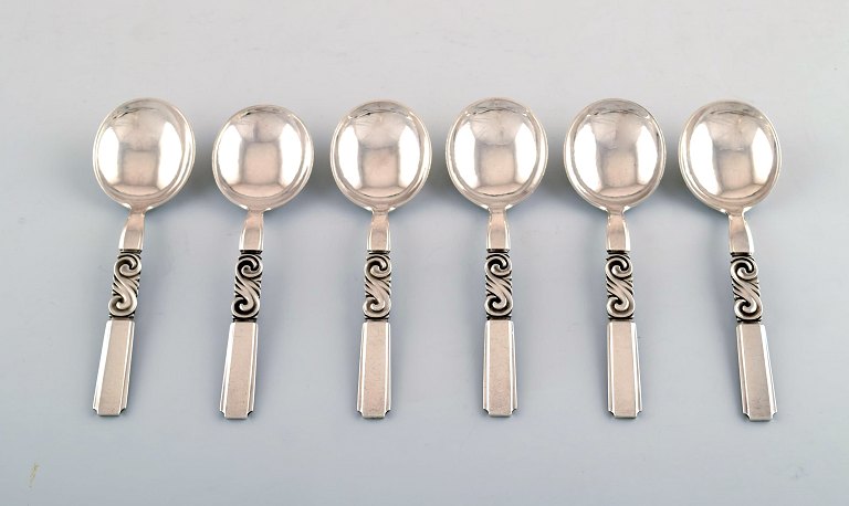 Georg Jensen. Cutlery, Scroll no. 22, hammered Sterling Silver consisting of: 6 bouillon spoons.