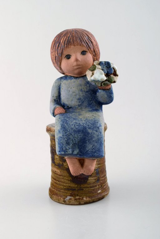 Lisa Larson for Gustavsberg. Rare stoneware figure. Girl with flowers.