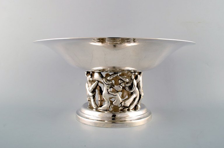 Jean Boggio for Roux-Marquiand, France. Large modernist compote in plated silver. Base with motive of dancing circus artists.