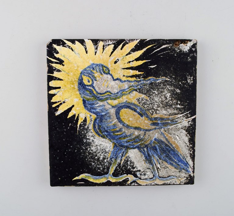 Jens Thirslund for Kähler, Denmark. Unique stoneware tile with bird motif. 1920 / 30