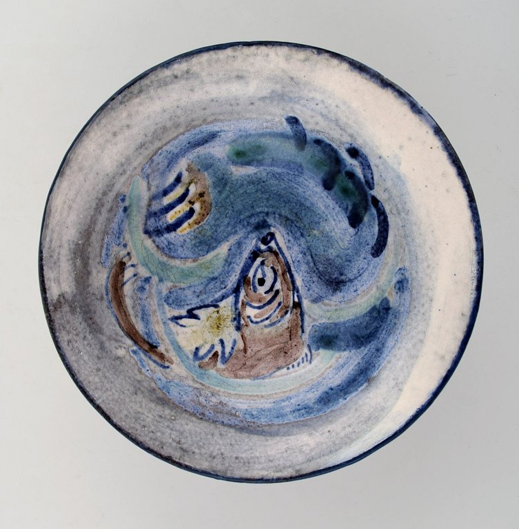 Julie Bloch Kyhn for Kähler, Denmark. Hand painted unique bowl in glazed ceramics with fish motif. Dated 1923.