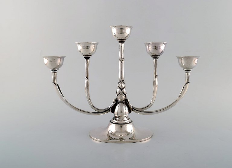 Harald Nielsen for Georg Jensen. Art deco "Pyramid" candelabra in sterling silver. Dated 1933-44. Design 537A.