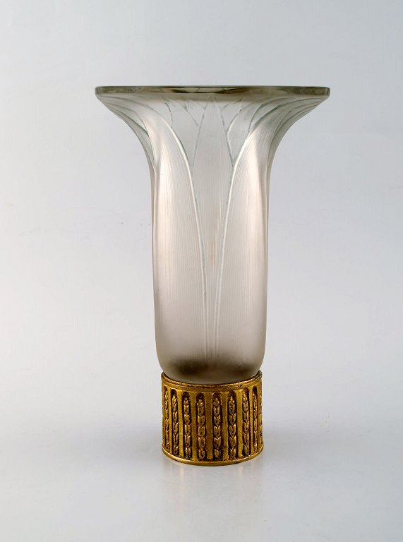 Early René Lalique "Lotus" vase in art glass with base of brass. Dated before 1945.