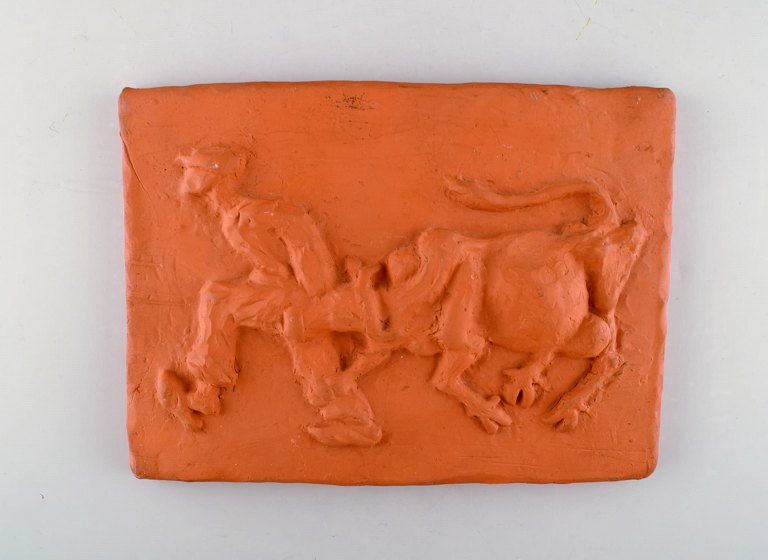 Kloster Ceramic, Ystad. Wall plaque in terracotta. The cow is driven home. Swedish design, 1960