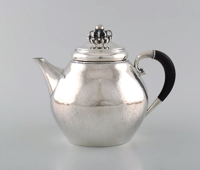 Rare Georg Jensen teapot in sterling silver with ebony handle. Dated 1915-30.