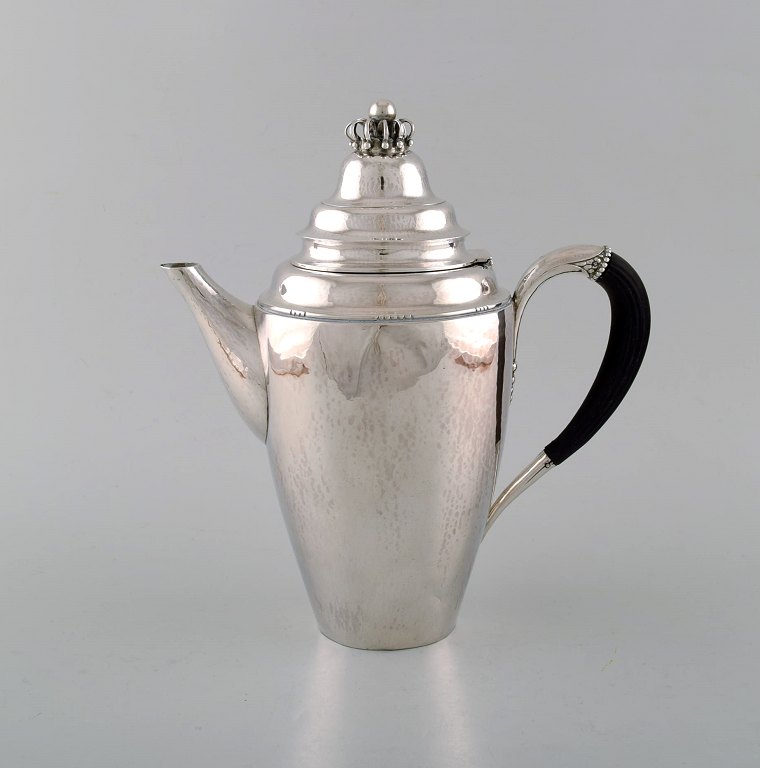 Rare Georg Jensen coffee pot in sterling silver with ebony handle. Dated 1915-30.