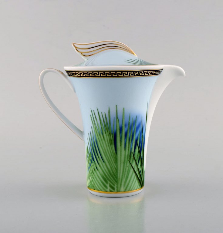 Gianni Versace for Rosenthal. "Jungle" porcelain creamer with gold decoration and green leaves. Late 20th century.