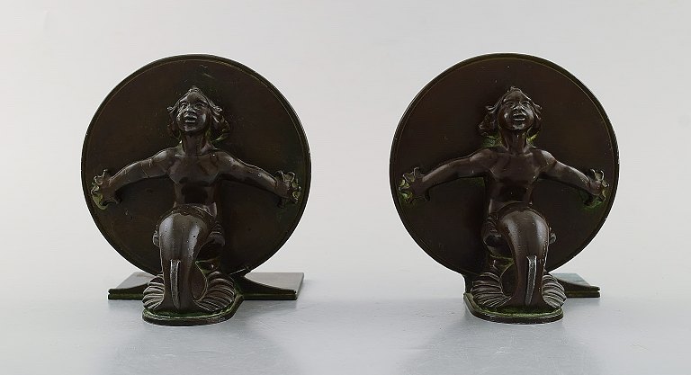 Just Andersen, Denmark. Two rare book stands in disko metal with sea men. 1940