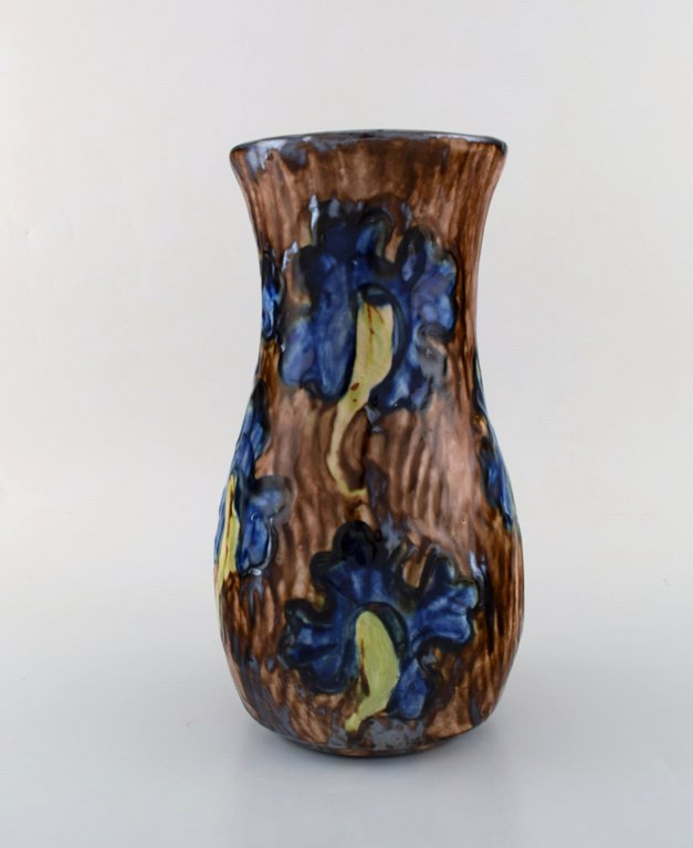 Roskilde Lervarefabrik, Denmark. Large art nouveau vase in glazed ceramics. Blue flowers in brown base. Dated 1915-1921. 