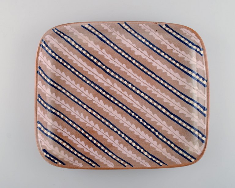 Anna-Lisa Thomson for Upsala-Ekeby. Large dish in glazed stoneware. Striped design. Mid-20th century.