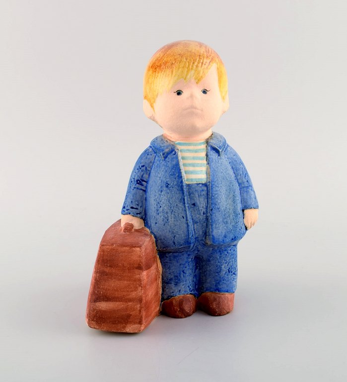 Lisa Larson for Gustavsberg. Rare figure in glazed ceramics. Boy with bag. 1970 / 80s.