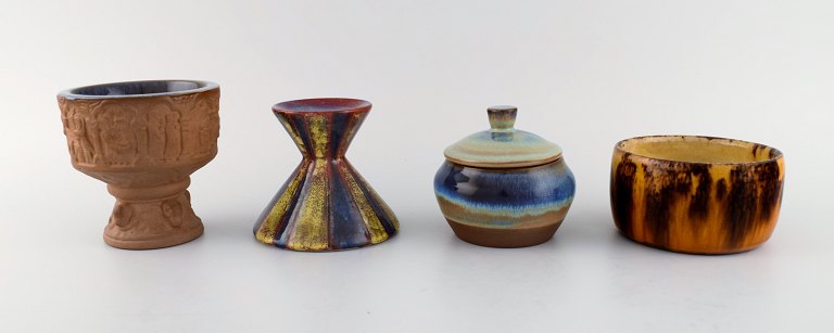 Michael Andersen, Denmark. Two bowls, candlestick and lidded jar in glazed ceramics. 1950s.