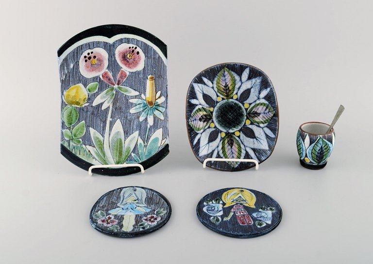 Tilgmans, Sweden. A collection of glazed ceramics decorated with girls and floral motifs. 1960s.