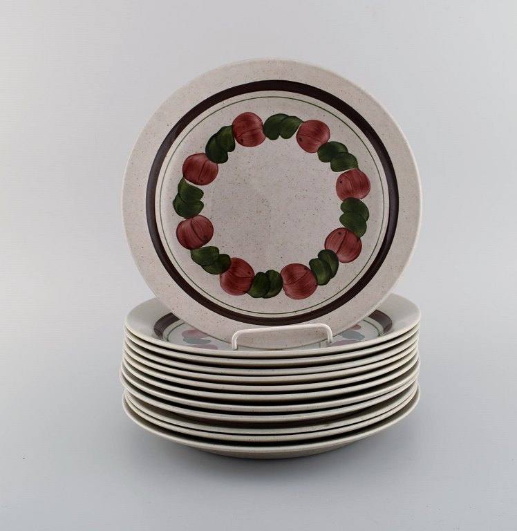 Jackie Lynd for Rörstrand. 12 Birgitta dinner plates in hand-painted glazed stoneware. 1970s.