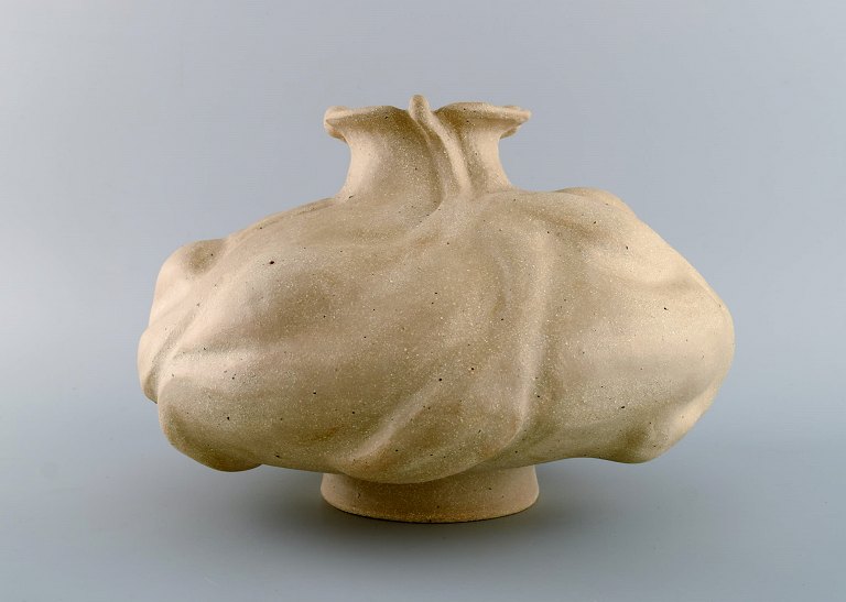 Christina Muff, Danish contemporary ceramicist (b. 1971). Hand modeled sculptural vase with flowerbud decoration. This dramatic looking sculptural vase stands unglazed. Part of the ‘Seed’ series by Christina Muff. One of a kind. 