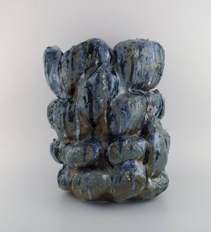 Christina Muff, Danish contemporary ceramicist (b. 1971). Large, hand modeled stoneware sculptural vase with protrusions. This vessel is glazed in hues of grey and blue with brown areas in the depths. Part of the 