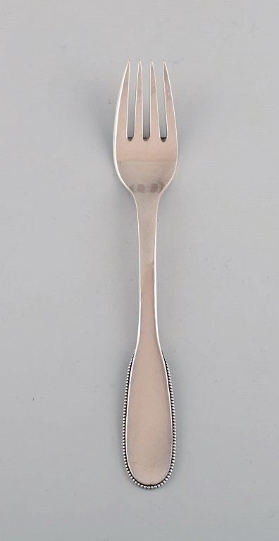 Evald Nielsen number 14 lunch fork in hammered silver (830). 1920s. 3 pcs in stock.