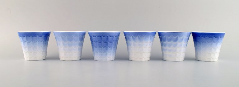 Wilhelm Kåge for Gustavsberg. Six flower pot covers in porcelain. Swedish design, 1960s.