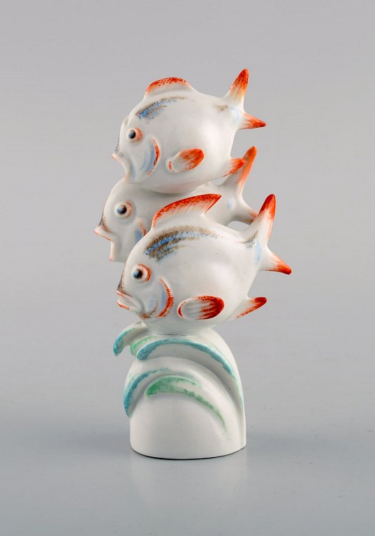 Willi Münch-Khe (1885-1960) for Meissen. Art deco figure in hand-painted porcelain. Three fish. 1930s.