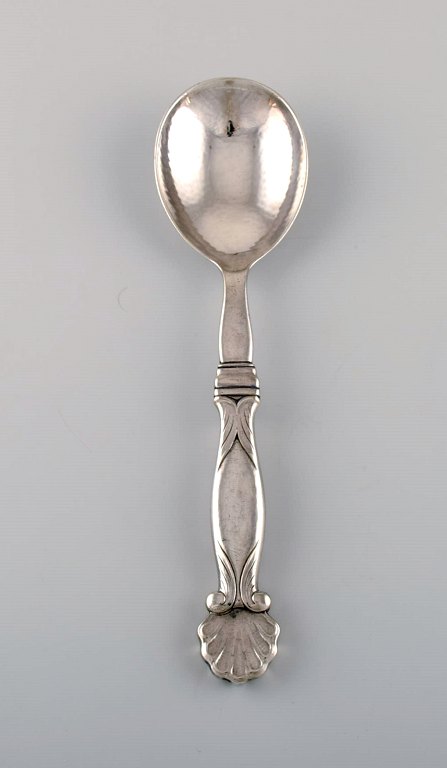 Rare Georg Jensen serving spoon in all sterling silver. Design 102. Dated 1930.