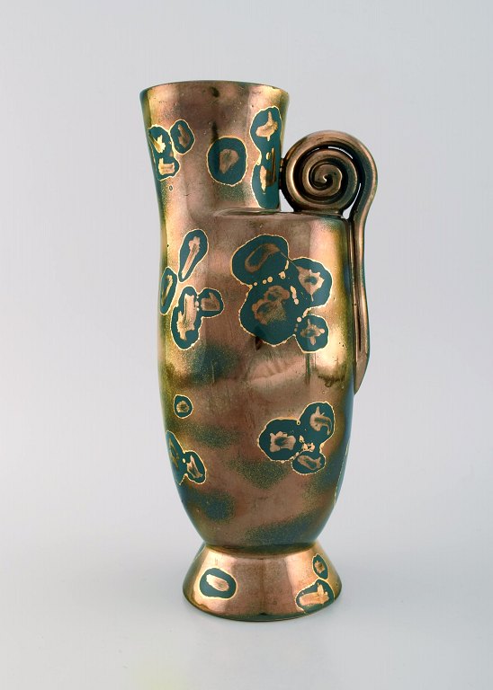 Arts Ceram Grand Feu, France. Vase / pitcher in glazed stoneware. Beautiful glaze in gold and green shades. 1920s.