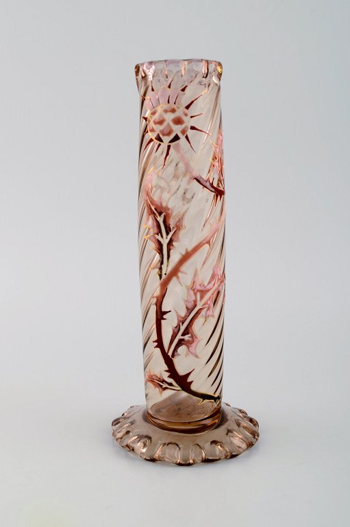Early Emile Gallé vase in clear frosted art glass. Carved with motifs in the form of flowers and leaves. Angular bottom and top. Enamel work and gilt. Museum quality. Ca. 1885.