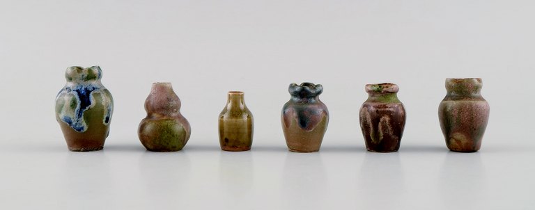 Six Belgian miniature vases in glazed ceramics. Mid-20th century.