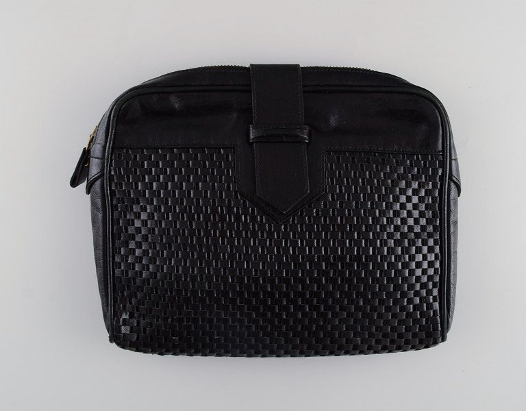 Vintage Yves Saint Laurent dinner purse in black leather with braided pattern. 1960s / 70s.