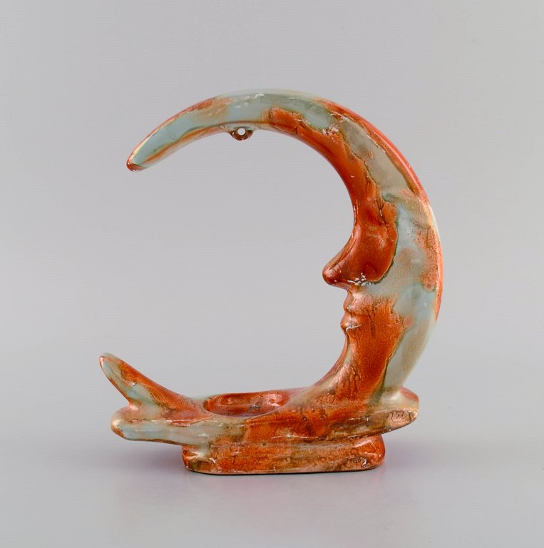 European studio ceramicist. Tealight candle holder shaped like the moon in glazed ceramics. Beautiful marbled glaze in orange and mother of pearl shades. Late 20th century.