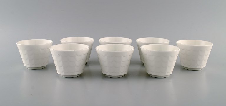Wilhelm Kåge for Gustavsberg. Eight herb pots in white glazed porcelain. Swedish design, 1960s.